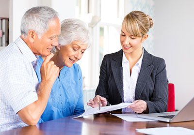 people talking to an insurance agent