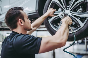 Man Working on Tire