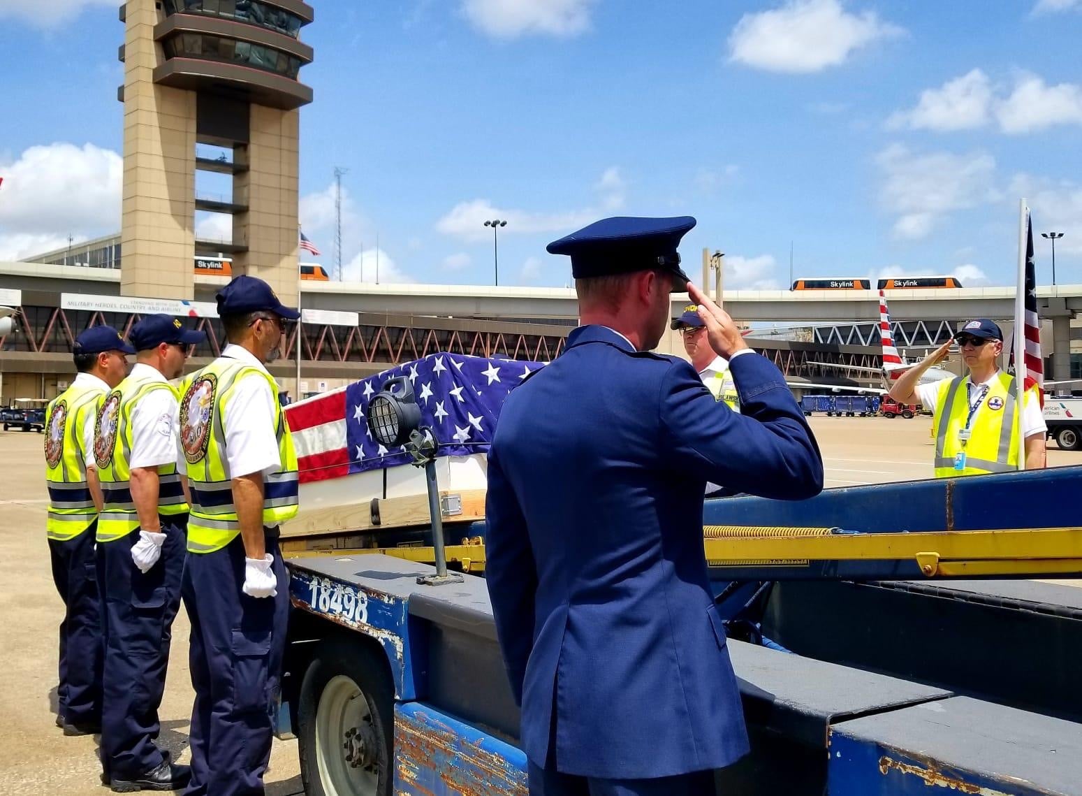 Maj Harvey Storms being escorted home