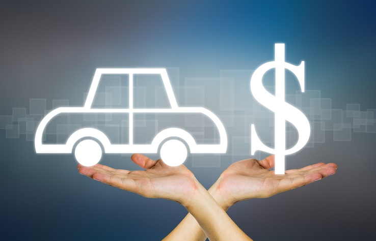 a car in one hand and dollar sign in the other